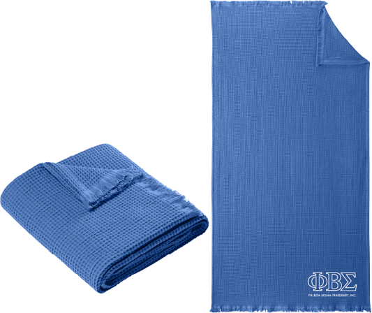 Blue textured towel with 'AKPsi' logo on a white background