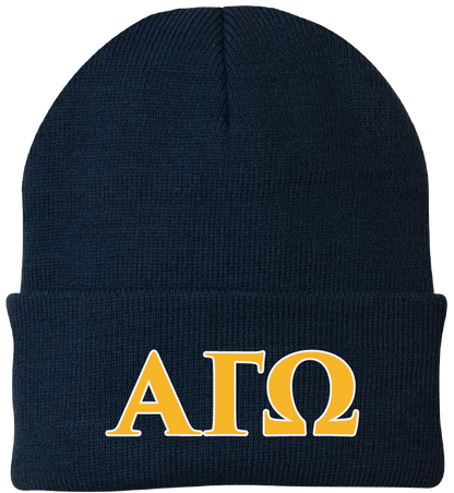 Navy blue beanie with yellow 'ΑΓΩ' letters on a white background