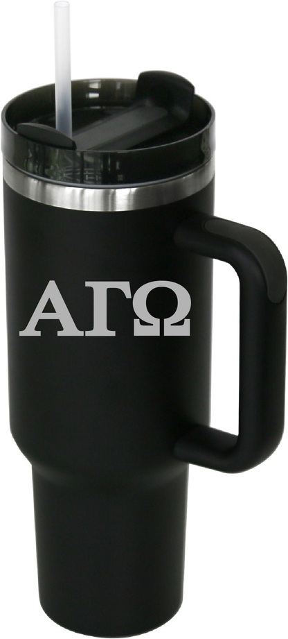 Black travel mug with handle and straw featuring 'ΑΓΩ' text on a white background