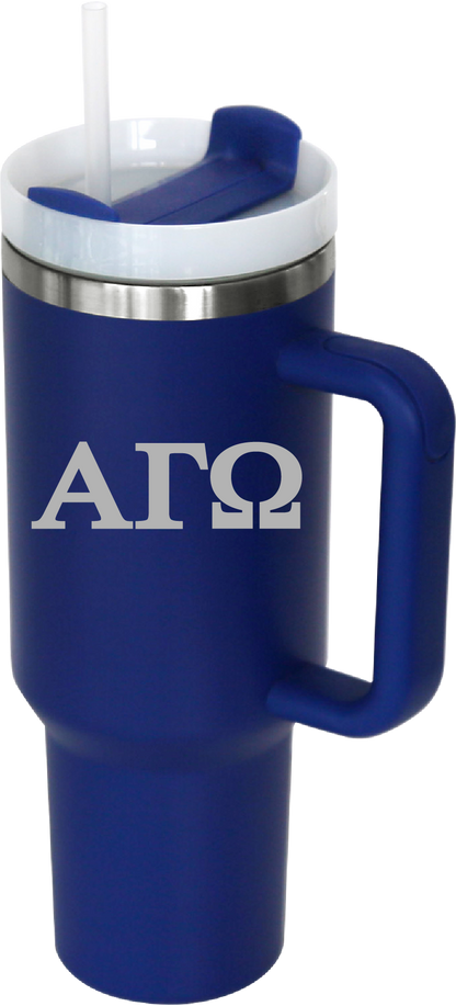 Blue travel mug with handle and 'ΑΓΩ' lettering on a white background