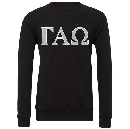A black long-sleeve crewneck sweatshirt featuring the Greek letters Gamma Alpha Omega (ΓΧΩ) printed in large silver block letters across the chest, displayed on a clean white background.