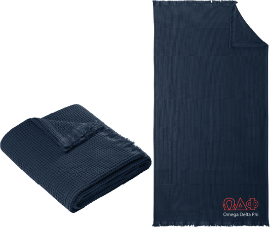 Navy blue textured blanket with 'Alpha Gamma Omega' logo on a white background