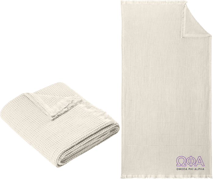 Folded beige blanket with Omega Phi Alpha logo on a white background