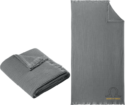 Gray textured blanket, folded and unfolded, with Alpha Delta Phi logo.