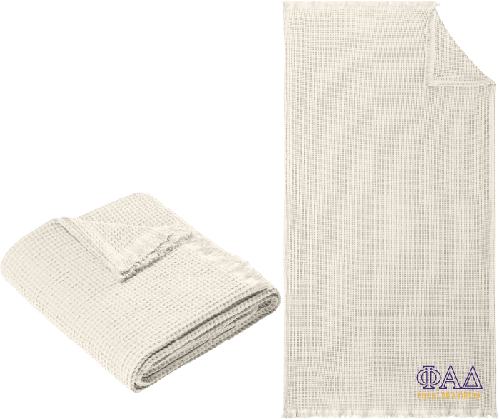 Folded textured blanket next to an unfolded one with 'Alpha Chi Rho' text on a white background