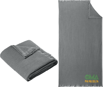 Gray textured blanket with folded and unfolded states on a white background, featuring Delta Zeta logo.