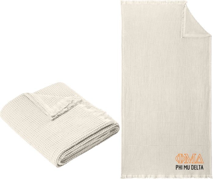 Beige textured blanket with 'OMA PHI MU DELTA' text on a white background