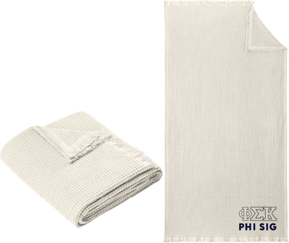 Folded beige blanket next to a larger beige blanket with Alpha Gamma Omega logo on a white background