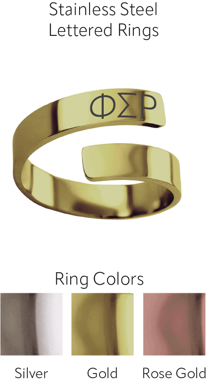A polished stainless steel lettered ring with the Greek letters Omega and Alpha engraved on a curved band, shown above three color swatches labeled Silver, Gold, and Rose Gold under the heading 'Stainless Steel Lettered Rings'.