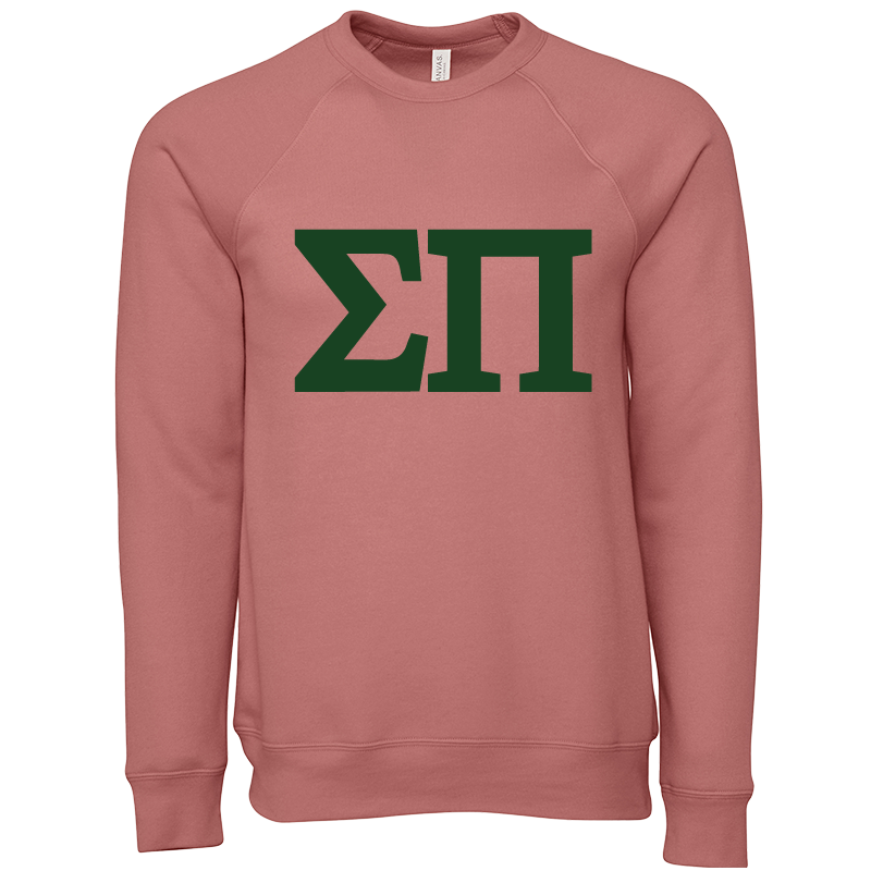 Pink sweatshirt with green letters on a white background