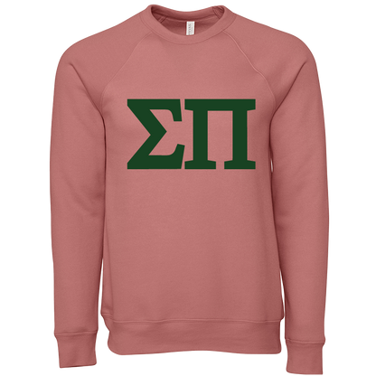 Pink sweatshirt with green letters on a white background
